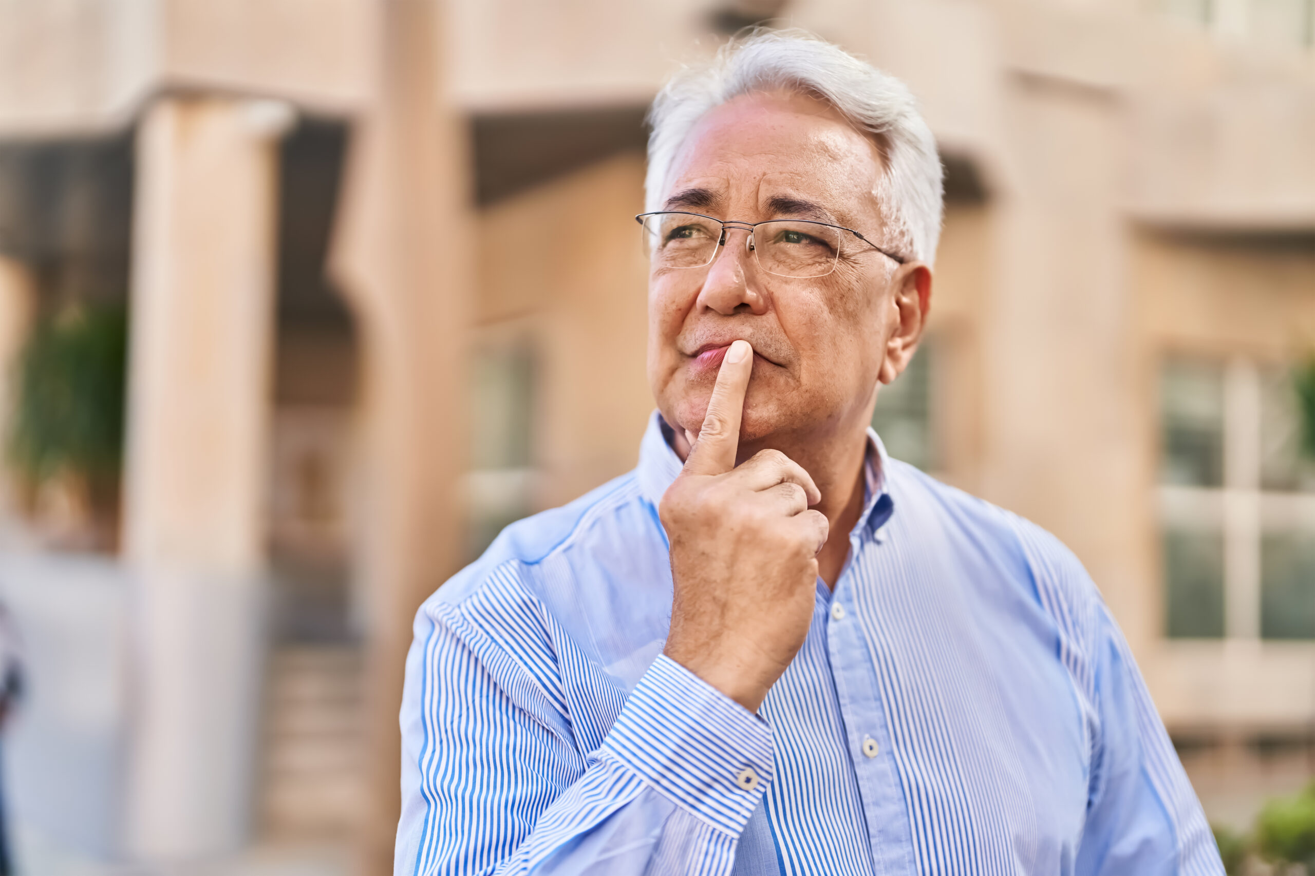 A senior thinking. Are these early signs of memory loss?